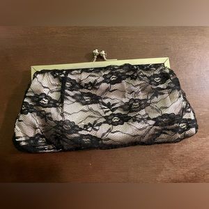 Black lace clutch with silver snap closure